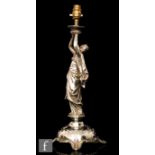 WMF - A late 19th Century continental figural lamp modelled as a classically dressed lady with arms