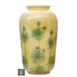 Ruskin Pottery - A vase of swollen barrel form decorated in the round with hand painted stylised
