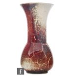 Ruskin Pottery - A large high fired vase of globe and shaft form decorated in a streaked lavender