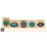 Ruskin Pottery - Five assorted roundels mounted as brooches of varying form,