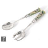 William Moorcroft - James Macintyre & Co - A pair of Florian Ware and silver plated salad servers