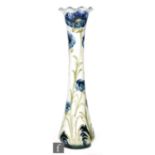 William Moorcroft - James Macintyre & Co - A vase of slender waisted form with a frilled rim neck