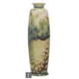 Ruskin Pottery - A high fired vase of rolling pin form decorated in a celadon green with a lavender