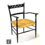 Sangueneti for Chiavari, Italy - An open armchair with pierced bar back over a woven grass seat,