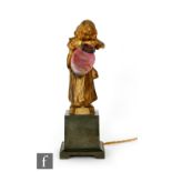 Leon Laporte-Blaisy & Daum - A gilt bronze and glass figural lamp modelled as a young girl in a
