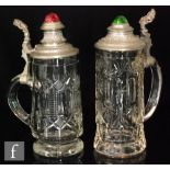 A 19th Century German clear crystal beer stein with cut decoration below pewter mounted stepped