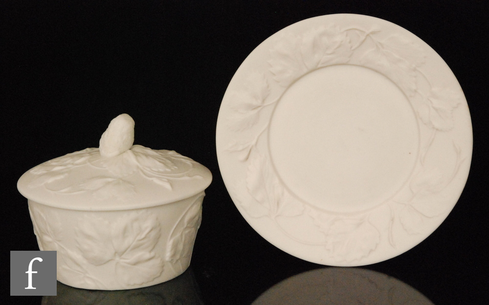 A 19th Century Royal Worcester Parian butter dish and stand decorated with relief cast strawberry