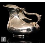 A continental silver squat ewer of plain bulbous form with elongated reeded handle and notch detail