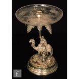 A 19th Century silver plated table decoration modelled as an Arabian man seated upon a camel