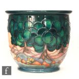 A modern Moorcroft Pottery jardinière in the Mamora pattern by Sally Tuffin decorated with a