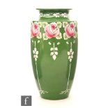 A 1920s Shelley vase of high shouldered form decorated with a band of stylised Glasgow type roses