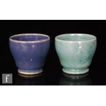 Two early 20th Century Ruskin Pottery miniature high sided footed bowls with lustre glazes,