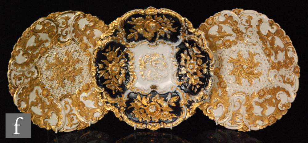 A group of three late 19th to early 20th Century Meissen shallow bowls decorated with relief