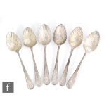 A composed set of six Georgian hallmarked silver table spoons with later decorated shell bowl,