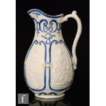 A mid 19th Century William Brownfield Parian relief moulded jug decorated with cast panels of