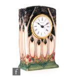 A modern Moorcroft Pottery clock decorated in the New Forest pattern by Rachel Bishop with a