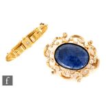 A 15ct bar brooch set with single diamond and a pierced oval Victorian brooch later set with an