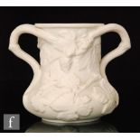 A 19th Century Copeland Parian twin handled beer mug decorated with relief moulded bunches of