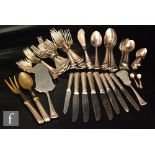 A part canteen of German silver cutlery, including various knives, spoons and forks, salad servers,