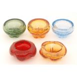 A group of later 20th Century glass bowls with internal controlled air bubble decoration,