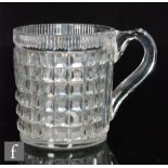 An early 19th Century tankard of cylindrical form with facet cut loop handle,