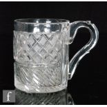 An early 19th Century tankard of cylindrical form with facet cut loop handle,