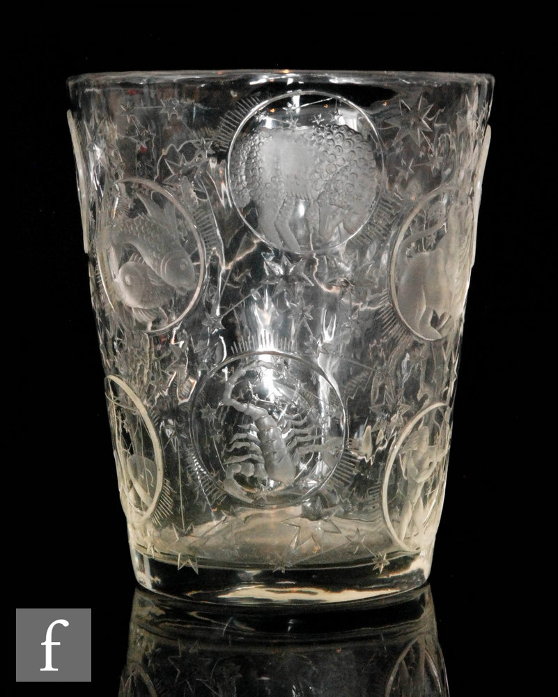 A 1940s Lobmeyr glass Zodiac vase of tumbler form designed by Vera Liskova cut and engraved with