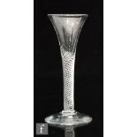 An 18th Century drinking glass circa 1750, drawn trumpet bowl above a multi series air twist stem,