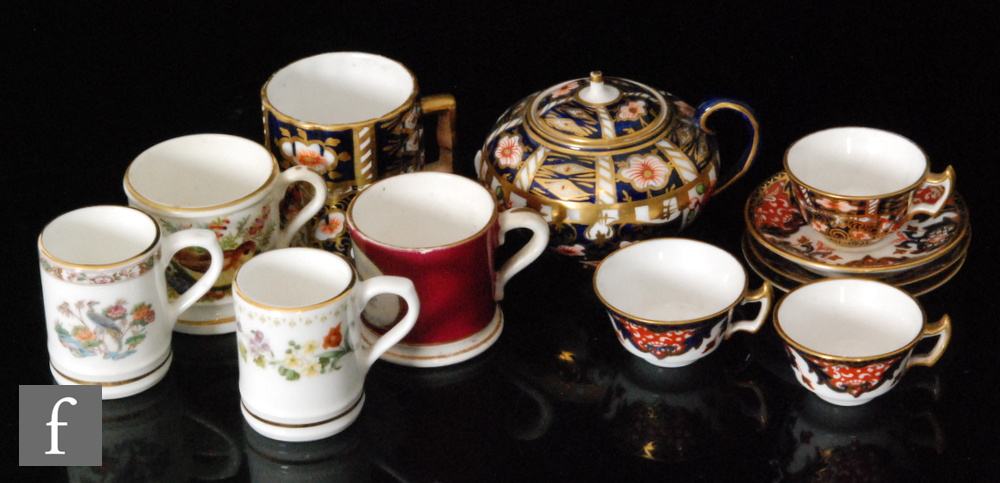 A collection of various porcelain miniature items,