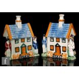 Two Staffordshire early 19th Century Prattware cottage money boxes, each of typical form,