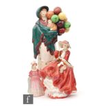 A group of three Royal Doulton figures, M36 Norma, HN1834 Top o' the Hill, HN583 The Balloon Seller,