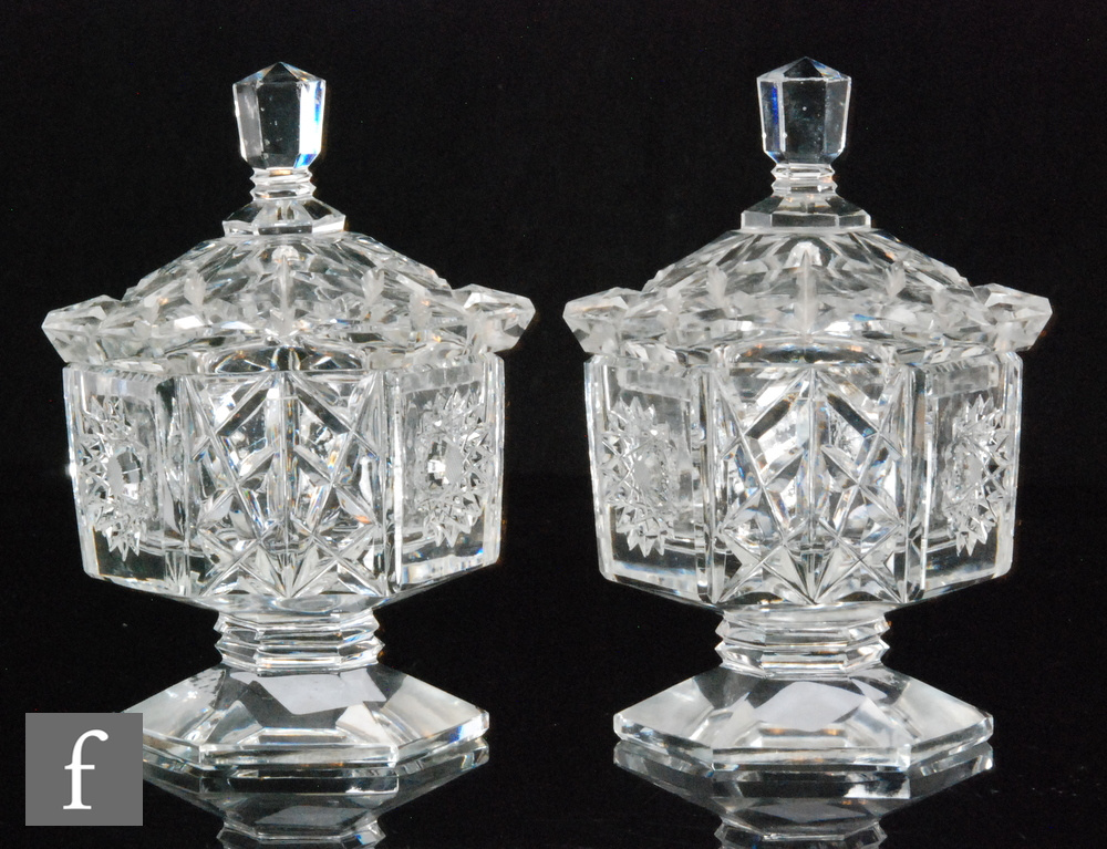 A pair of late 19th Century French crystal glass bowls and covers, possibly Baccarat,