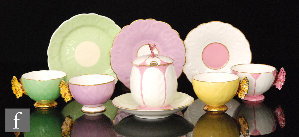 A small collection of assorted Aynsley China Butterfly tea wares comprising three cups and saucers,