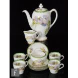 A Royal Doulton 'Glamis Thistle' coffee service, comprising coffee pot, four cups, five saucers,