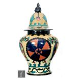 An early 20th Century Royal Cauldon 'Cairo' ware vase and cover by Frederick Rhead,