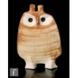A large owl figure in unglazed earthenware with tan wash decoration produced by Cinque Ports,