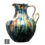 An early 20th Century Belgian art pottery pitcher, possibly Roger Guerin Boufflioulx,