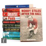 A collection of signed autograph books by famous sportsmen to include Nobby Stiles, Greavsie,