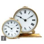A GWR brass barrel clock by Kay & Co Paris and a 3 1/2 inch main clock for R Lanbryn Railway No.