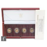 Elizabeth II - A 2003 gold proof pattern one pound four coin set with certificate in presentation