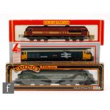 Three OO gauge diesel locomotives, Hornby R2075 Class 56 EWS 56058,