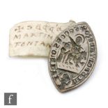 A Medieval bronze Vessica seal matrice for MARRTINI D FONTANESO depicting Christ or a saint on