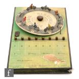 An Electric Speedway board game by BGL London, the turn table mounted with eight lead riders,