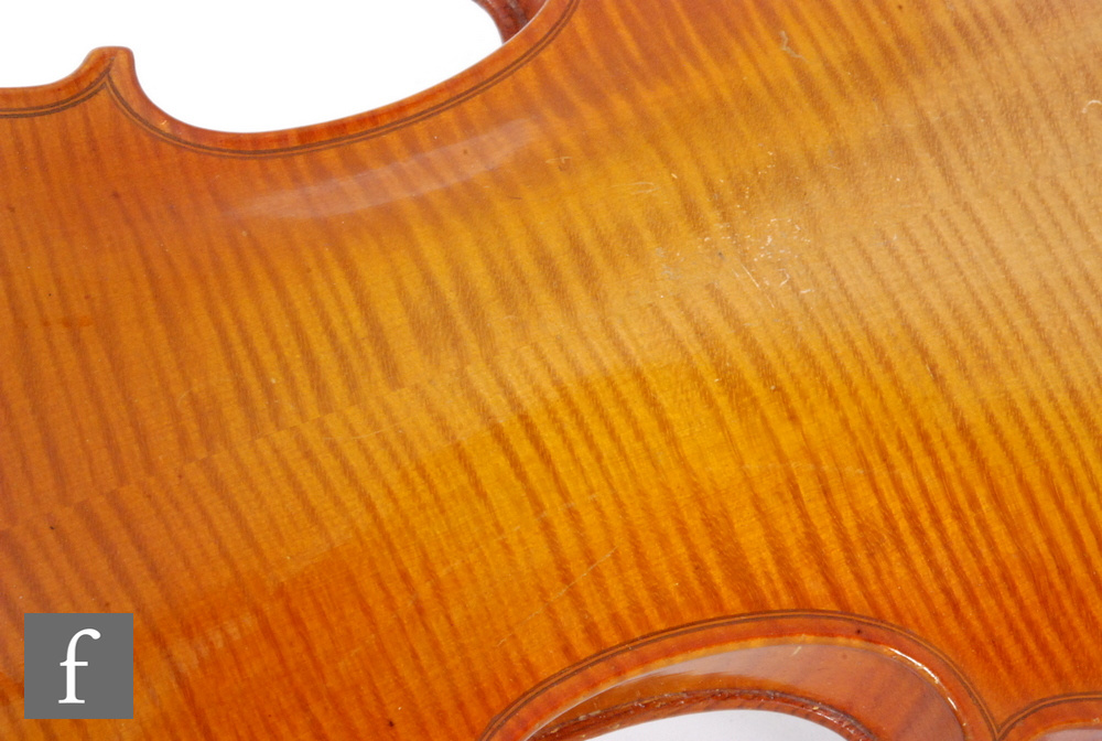 A 1920 to 1930s violin, the reverse stamped Stainer, length of back 35.5cm and with a bow, cased. - Image 14 of 17