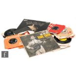 A collection of various 1950s to 1960s records,