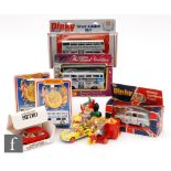 A Corgi Noddy's Car diecast model in yellow and red with Noddy, Big Ears and grey faced Golly,