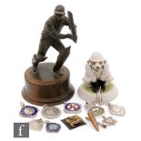 A 20th Century cold cast cricket figure of Peter Hicks batting,