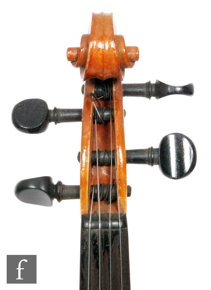 A 1920 to 1930s violin, the reverse stamped Stainer, length of back 35.5cm and with a bow, cased. - Image 10 of 17