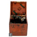 An early lacquered brass theodolite with accessories in mahogany fitted case,