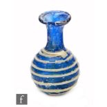 Roman 2nd to 4th Century AD - A miniature cobalt blue globular form flask decorated with white bee